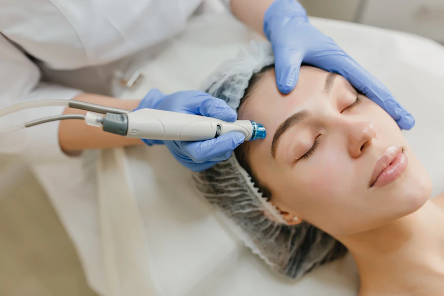 A client receiving a light-based skin rejuvenation treatment